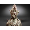 Tārā on a lotus throne bronze